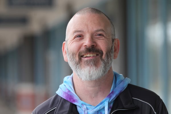 Steven Fish, of Garnett, Kansas, was unable to register to vote in 2014 under a state law requiring people to show proof of their U.S. citizenship, and he returns to the same strip mall where he went to register, Monday, Dec. 9, 2024, in Lawrence, Kan. (AP Photo/John Hanna)