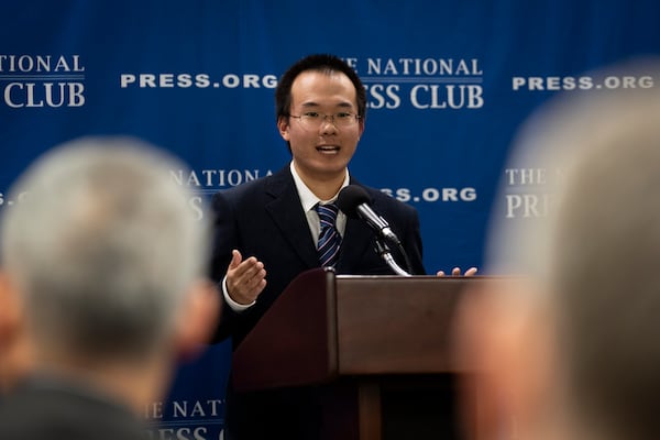 Dong Yifu, the son of imprisoned Chinese veteran journalist Dong Yuyu who was sentenced to seven years in prison on espionage charges, speaks about his father's detention to the National Press Club in Washington, Monday, Feb. 24, 2025. (AP Photo/Ben Curtis)