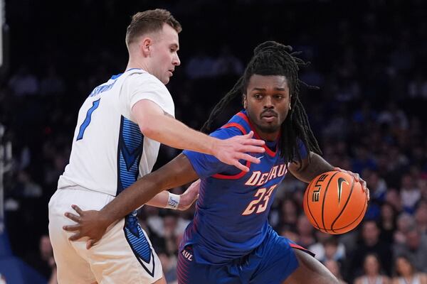 Creighton's Steven Ashworth (1) defends DePaul's David Thomas (23) during the second half of an NCAA college basketball game at the Big East basketball tournament Thursday, March 13, 2025, in New York. (AP Photo/Frank Franklin II)