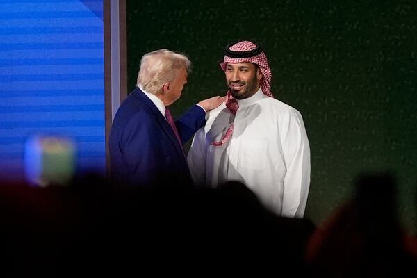 President Donald Trump shakes hands with Saudi Crown Prince Mohammed bin Salman after his speech at the King Abdulaziz International Conference Center in Riyadh, Saudi Arabia, Tuesday, May 13, 2025. (AP Photo/Alex Brandon)