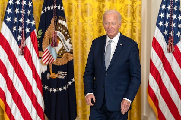 President Joe Biden stands during an event to award the Presidential Citizens Medal to recipients in the East Room at the White House, Thursday, Jan. 2, 2025, in Washington. (AP Photo/Mark Schiefelbein)