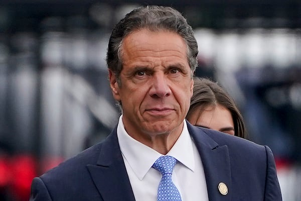 FILE - New York Gov. Andrew Cuomo prepares to board a helicopter after announcing his resignation, Aug. 10, 2021, in New York. (AP Photo/Seth Wenig, File)