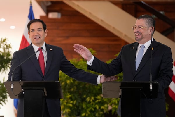 Secretary of State Marco Rubio, left, and Costa Rican President Rodrigo Chaves give a joint news conference at the presidential palace in San Jose, Costa Rica, Tuesday, Feb. 4, 2025. (AP Photo/Mark Schiefelbein, Pool)