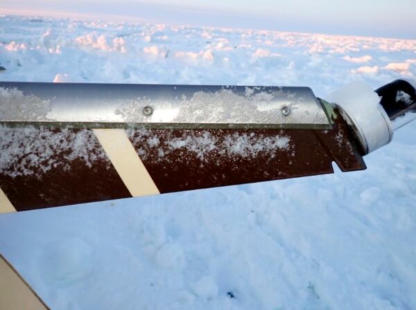 This image released by the National Transportation Safety Board, shows ice accumulation that was observed by investigators on the base of the beacon/strobe light located at the top of the vertical stabilizer, Feb. 7, 2025, they day after after a small commuter plane that crashed in western Alaska on a flight that was bound for the hub community of Nome. (National Transportation Safety Board via AP, File)