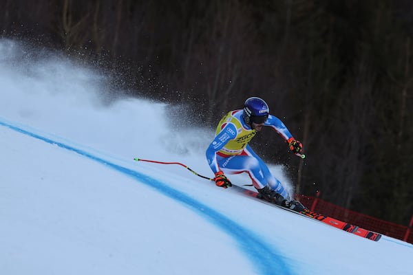 France's Cyprien Sarrazin speeds down the course during an alpine ski, men's World Cup downhill training, in Bormio, Italy, Friday, Dec. 27, 2024. (AP Photo/Marco Trovati)