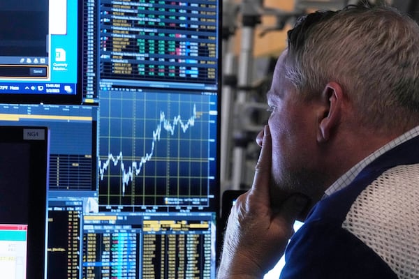 Trader Rob Taylor works on the floor of the New York Stock Exchange, Friday, May 2, 2025. (AP Photo/Richard Drew)