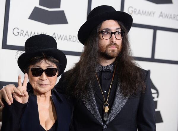 FILE - Yoko Ono, wife of the late John Lennon, left, and their son Sean Lennon arrive at the 56th annual Grammy Awards in Los Angeles on Jan. 26, 2014. (Photo by Jordan Strauss/Invision/AP, File)