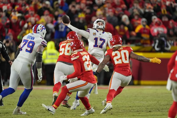 Buffalo Bills quarterback Josh Allen (17) attempts a pass during the second half of the AFC Championship NFL football game against the Kansas City Chiefs, Sunday, Jan. 26, 2025, in Kansas City, Mo. (AP Photo/Charlie Riedel)