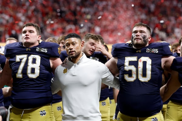 Notre Dame head coach Marcus Freeman watches after their loss against Ohio State in the College Football Playoff national championship game Monday, Jan. 20, 2025, in Atlanta. (AP Photo/Butch Dill)