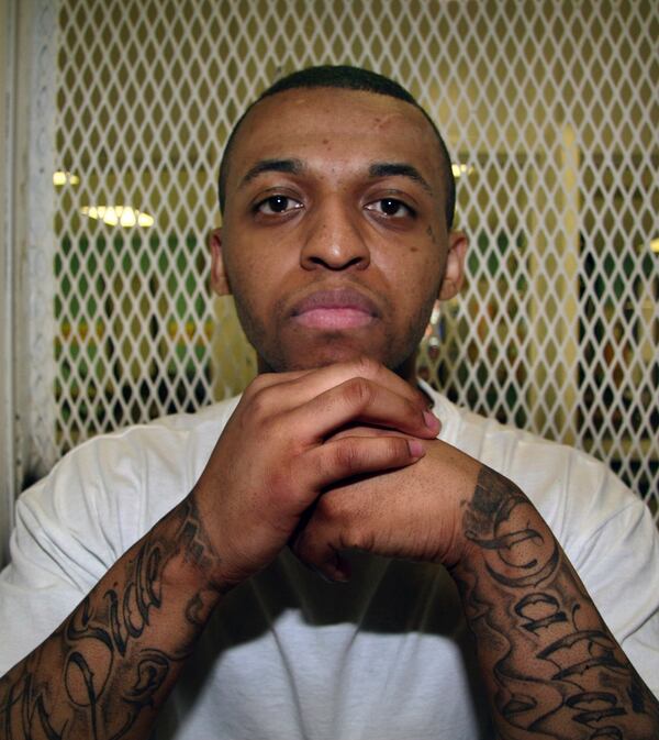 FILE - Texas death row inmate Steven Lawayne Nelson poses for a photo in a visiting cage at the Texas Department of Criminal Justice Polunsky Unit outside Livingston, Texas, on Dec. 5, 2012. (AP Photo/Michael Graczyk, File)