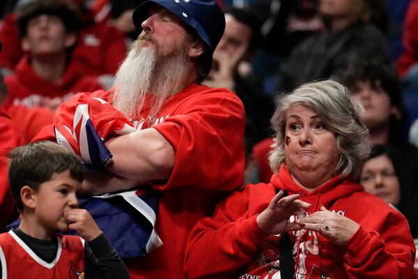 Louisville fans watch play against Creighton during the second half in the first round of the NCAA college basketball tournament, Thursday, March 20, 2025, in Lexington, Ky. (AP Photo/Brynn Anderson)