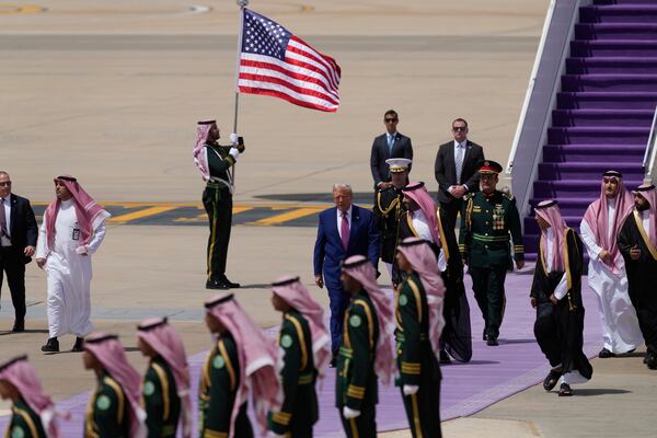 President Donald Trump speaks with Saudi Crown Prince Mohammed bin Salman during an arrival ceremony at the Royal Terminal of King Khalid International Airport in Riyadh, Saudi Arabia, Tuesday, May 13, 2025. (AP Photo/Alex Brandon)