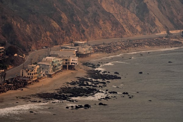 Beach front properties are left destroyed by the Palisades Fire, in this aerial view, Thursday, Jan. 9, 2025 in Malibu, Calif. (AP Photo/Mark J. Terrill)