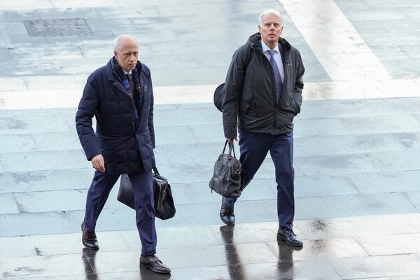 Amanda Knox lawyers Luca Luparia Donati, left, and Carlo Dalla Vedova arrive at the first section of the Supreme Court in Rome, in Rome, Thursday, Jan. 23, 2025. (AP Photo/Andrew Medichini)