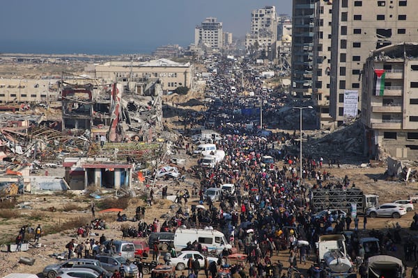 Displaced Palestinians return to their homes in the northern Gaza Strip, following Israel's decision to allow thousands of them to go back for the first time since the early weeks of the 15-month war with Hamas, Monday, Jan. 27, 2025. (AP Photo/Abed Hajjar)