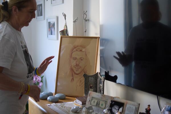 Ruhama Bohbot, mother of hostage Elkana Bohbot, has a picture of her son on display at her home in Mevaseret Zion, Israel, Wednesday, May 7, 2025. (AP Photo/Maya Alleruzzo)