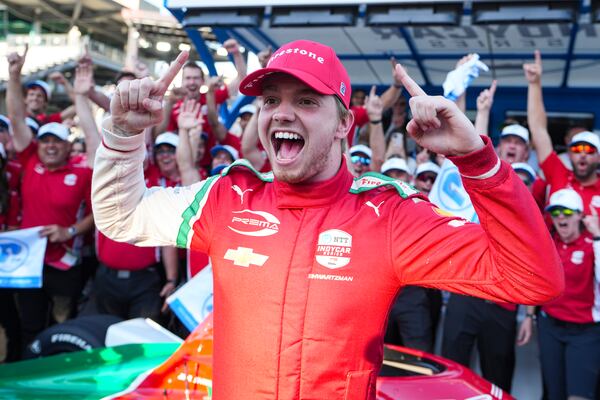 Robert Shwartzman, of Israel, celebrates after winning the pole position during qualifications for the Indianapolis 500 auto race at Indianapolis Motor Speedway in Indianapolis, Sunday, May 18, 2025. (AP Photo/Michael Conroy)