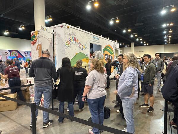 Berkshire Hathaway shareholders line up Friday, May 2, 2025 for the chance to buy Warren Buffett and Charlie Munger Squishmallows in Omaha, Neb. (AP Photo/Josh Funk)