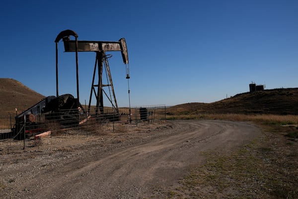 FILE - A pumpjack works in a pasture, Sept. 30, 2024, near Hays, Kan. (AP Photo/Charlie Riedel, File)