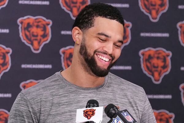 Chicago Bears quarterback Caleb Williams talks to media at a news conference after NFL football practice in Lake Forest, Ill., Wednesday, May 28, 2025. (AP Photo/Nam Y. Huh)
