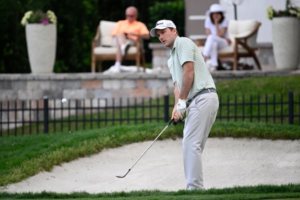 Russell Henley hits onto the 16th green during the third round of the Arnold Palmer Invitational at Bay Hill golf tournament, Saturday, March 8, 2025, in Orlando, Fla. (AP Photo/Phelan M. Ebenhack)