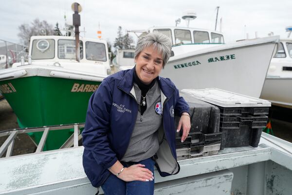 Commercial lobster fisherman Virginia Olsen sits for a portrait in Stonington, Maine, on Friday, May 2, 2025. (AP Photo/Robert F. Bukaty)