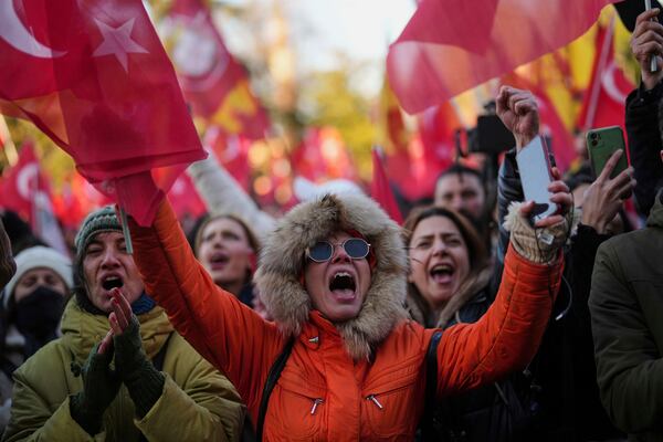 People gather outside the City Hall to protest the arrest of Istanbul Mayor Ekrem Imamoglu in Istanbul, Turkey, Wednesday, March 19, 2025. (AP Photo/Francisco Seco)