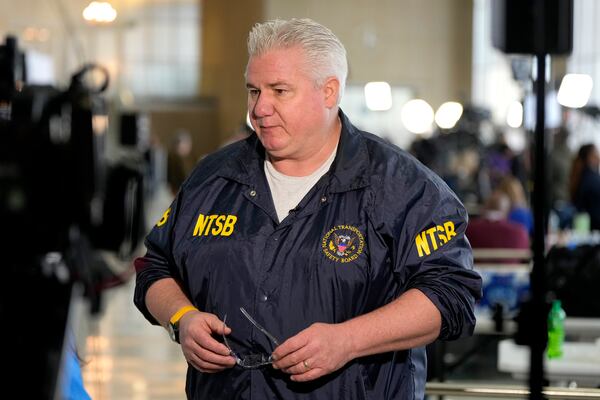 National Transportation Safety Board member Todd Inman speaks with reporters at Ronald Reagan Washington National Airport, Friday, Jan. 31, 2025, in Arlington, Va. (AP Photo/Alex Brandon)