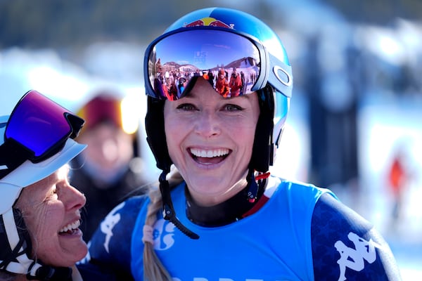 Lindsey Vonn talks with fans after racing at Copper Mountain Ski Resort, Sunday, Dec. 8, 2024, in Copper Mountain, Colo. (AP Photo/Robert F. Bukaty)