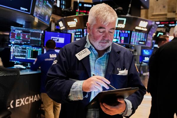 Trader Edward McCarthy works on the floor of the New York Stock Exchange, Tuesday, May 20, 2025. (AP Photo/Richard Drew)