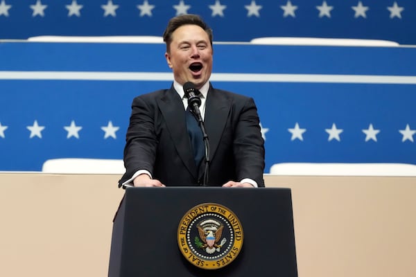 Elon Musk speaks at an indoor Presidential Inauguration parade event in Washington, Monday, Jan. 20, 2025. (AP Photo/Matt Rourke)