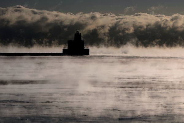 With temperatures below zero, steam rises over Lake Michigan Tuesday, Feb. 18, 2025, in Milwaukee. (AP Photo/Morry Gash)