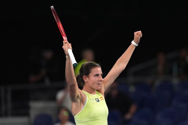 Emma Navarro of the U.S. celebrates after defeating Daria Kasatkina of Russia in their fourth round match at the Australian Open tennis championship in Melbourne, Australia, Monday, Jan. 20, 2025. (AP Photo/Ng Han Guan)