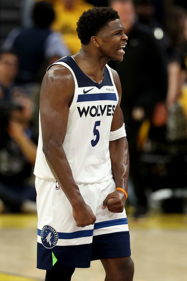 Minnesota Timberwolves guard Anthony Edwards (5) celebrates after scoring during the first half of Game 4 in the Western Conference semifinals of the NBA basketball playoffs against the Golden State Warriors, Monday, May 12, 2025, in San Francisco. (AP Photo/Jed Jacobsohn)