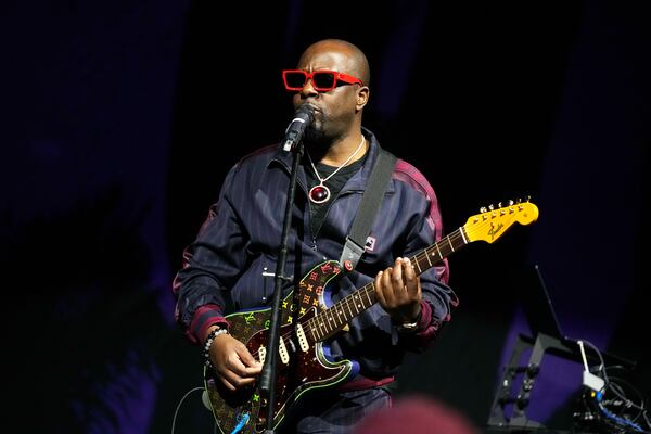FILE - Singer and activist Wyclef Jean performs after a WNBA basketball game between the Phoenix Mercury and the Chicago Sky, May 21, 2023, in Phoenix. (AP Photo/Ross D. Franklin, file)