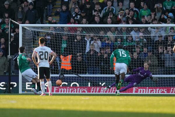 Plymouth Argyle's Ryan Hardie scores his side's first goal from the penalty spot during the English FA Cup fourth round soccer match between Plymouth Argyle and Liverpool at Home Park stadium in Plymouth, England, Sunday, Feb. 9, 2025. (AP Photo/Alastair Grant)