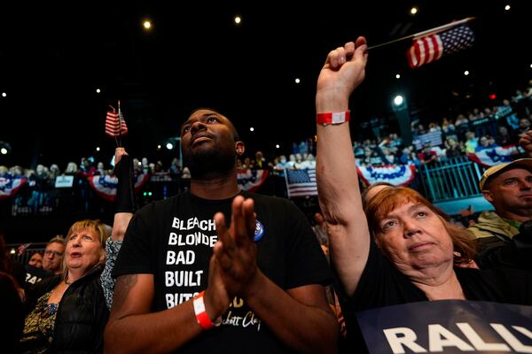 People cheer during a Rally for our Republic gathering, Saturday, March 22, 2025, in Atlanta. (AP Photo/Mike Stewart)