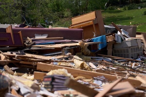 A piano rests atop what is left of the destroyed Sunshine Hill Baptist Church, Sunday, May 18, 2025, in London, Ky., after a severe storm passed through the area. (AP Photo/Carolyn Kaster)