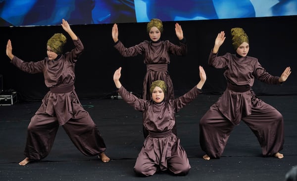 Dancers perform during the commemoration of the 20th anniversary of the Indian Ocean tsunami, in Banda Aceh, Indonesia, Saturday, Dec. 14, 2024. (AP Photo/Achmad Ibrahim)