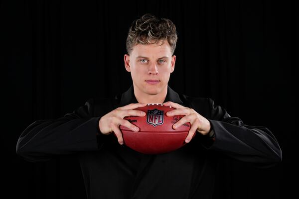 Cincinnati Bengals' Joe Burrow, AP NFL Comeback Player of the Year, poses after winning the award at the NFL Honors award show ahead of the Super Bowl 59 football game, Thursday, Feb. 6, 2025, in New Orleans. (AP Photo/Matt York)