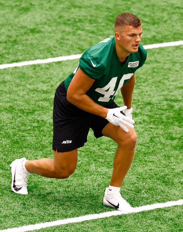 New York Jets tight end Mason Taylor (46) stretches during the NFL football team's rookie camp, Friday, May 9, 2025, in Florham Park, N.J. (AP Photo/Noah K. Murray)