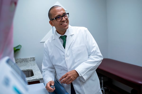 Pediatric endocrinologist Dr. Hector Granados speaks during an interview at his private practice in El Paso, Texas, Tuesday, Jan. 21, 2025. (AP Photo/Andres Leighton)