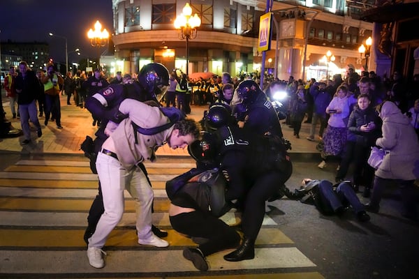 FILE - Riot police detain demonstrators at a protest in Moscow, Russia, Sept. 21, 2022, after President Vladimir Putin ordered a partial mobilization of reservists for the conflict in Ukraine. (AP Photo, File)