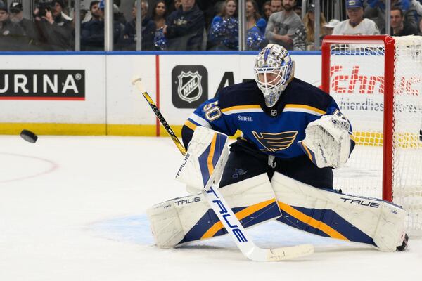 St. Louis Blues goaltender Jordan Binnington defends the net against the Winnipeg Jets during the third period in Game 6 of an NHL hockey first-round playoff series Friday, May 2, 2025, in St. Louis. (AP Photo/Jeff Le)
