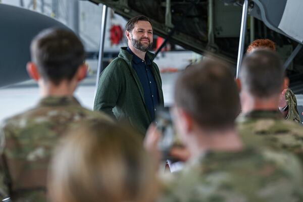 U.S. Vice President JD Vance visits with service members during a refueling stop at Ramstein Air Base,, Germany, Thursday April 24, 2025. (Kenny Holston/Pool Photo via AP)