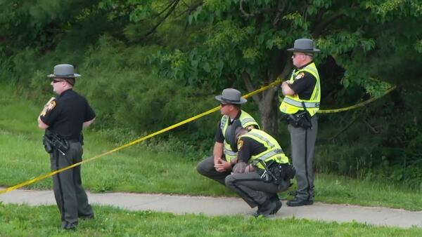 Police investigate the scene where a county deputy was struck and killed by a vehicle on Friday, May 2, 2025 in Cincinnati. (WCPO via AP)