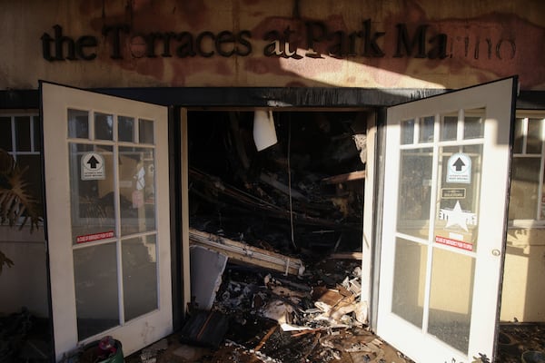 Damage is seen to the Terraces at Park Marino assisted living facility from the Eaton Fire on Sunday, Jan. 12, 2025, in Pasadena, Calif. (AP Photo/Ethan Swope)