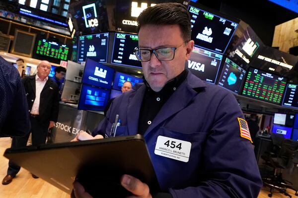 Trader Americo Brunetti works on the floor of the New York Stock Exchange, Monday, May 12, 2025. (AP Photo/Richard Drew)