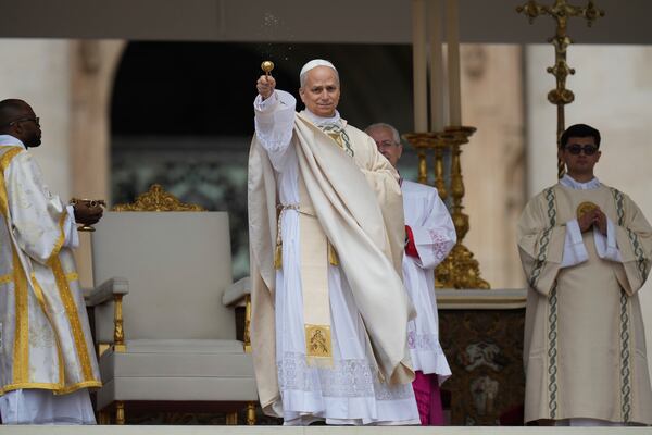 Pope Leo XIV holds Mass during the formal inauguration of his pontificate in St. Peter's Square attended by heads of state, royalty and ordinary faithful, Sunday, May 18, 2025. (AP Photo/Alessandra Tarantino)