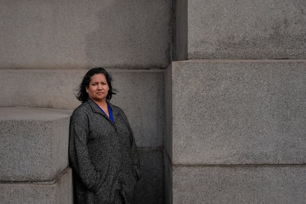 Karen Ortiz, an administrative judge at the Equal Employment Opportunity Commission, poses for photos, Wednesday, Feb. 26, 2025, in New York. (AP Photo/Julia Demaree Nikhinson)